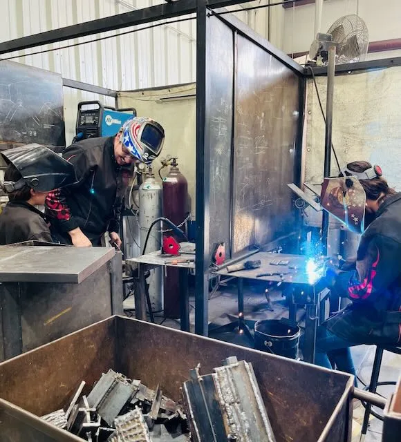 Welding instruction taking place in the CTA workshop
