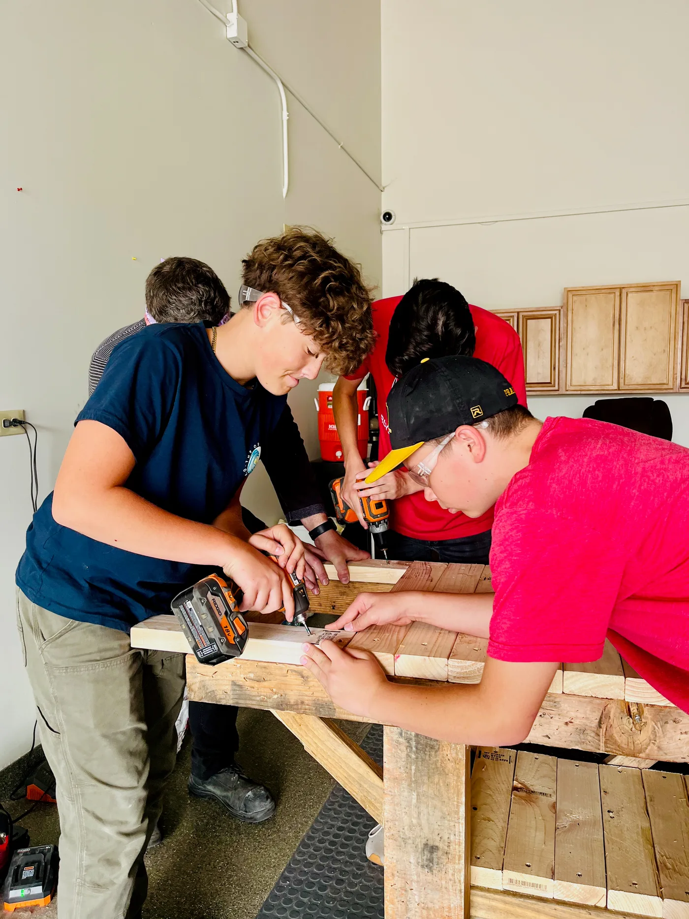 Students collaborating on a building project at CTA